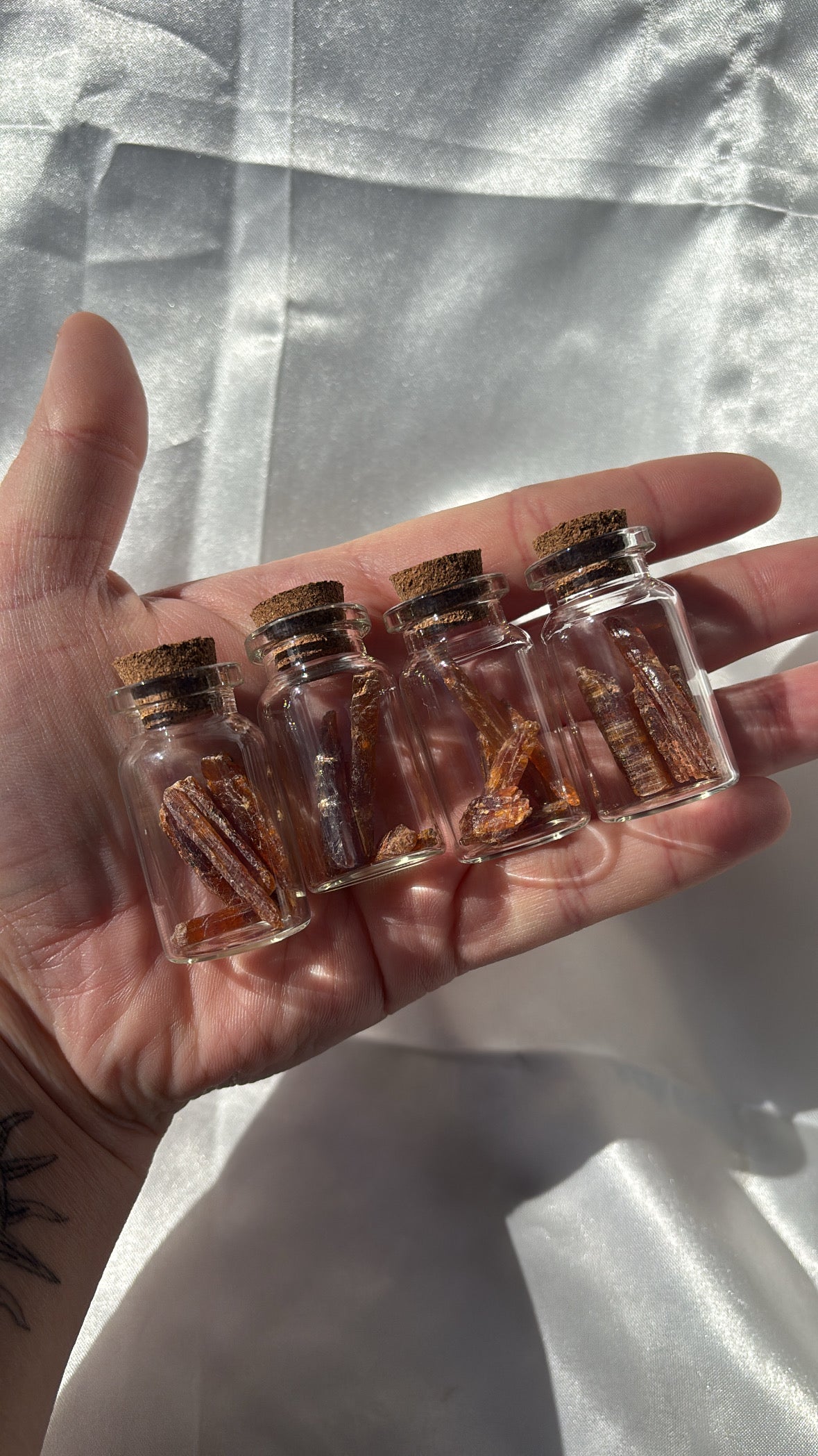 Orange Kyanite Pieces In Jars