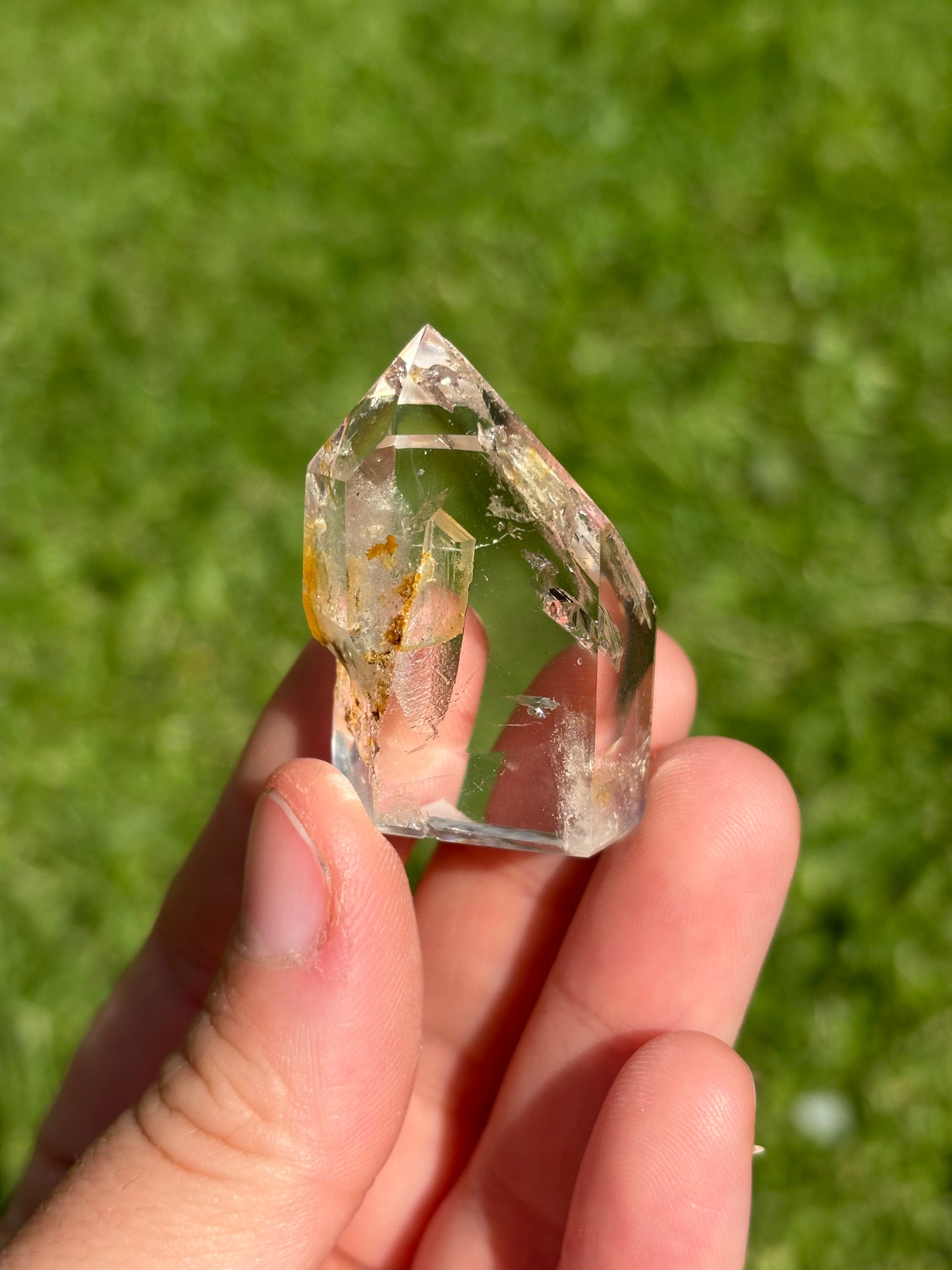 Clear Quartz Point With Golden Healer Inclusion