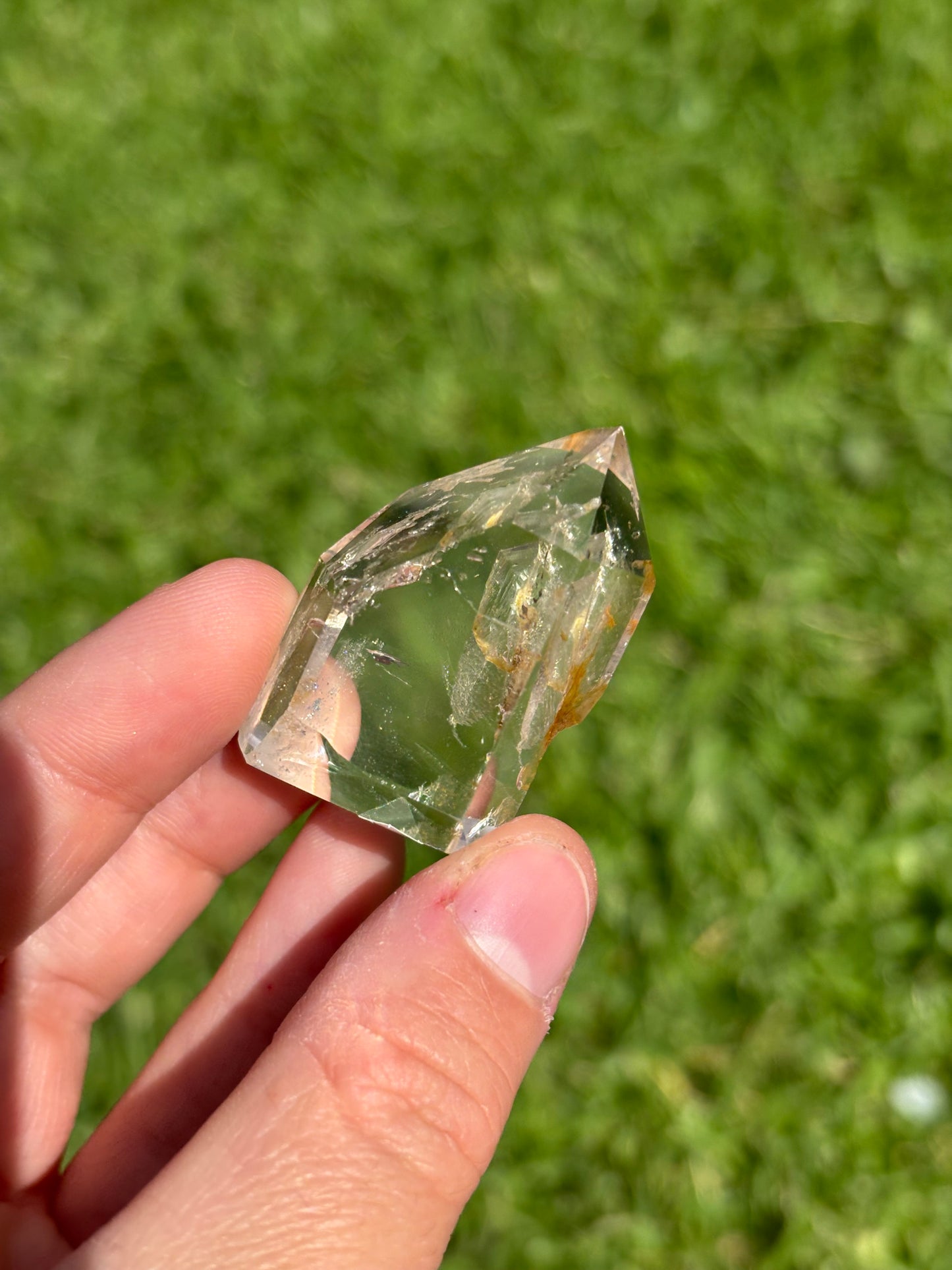 Clear Quartz Point With Golden Healer Inclusion